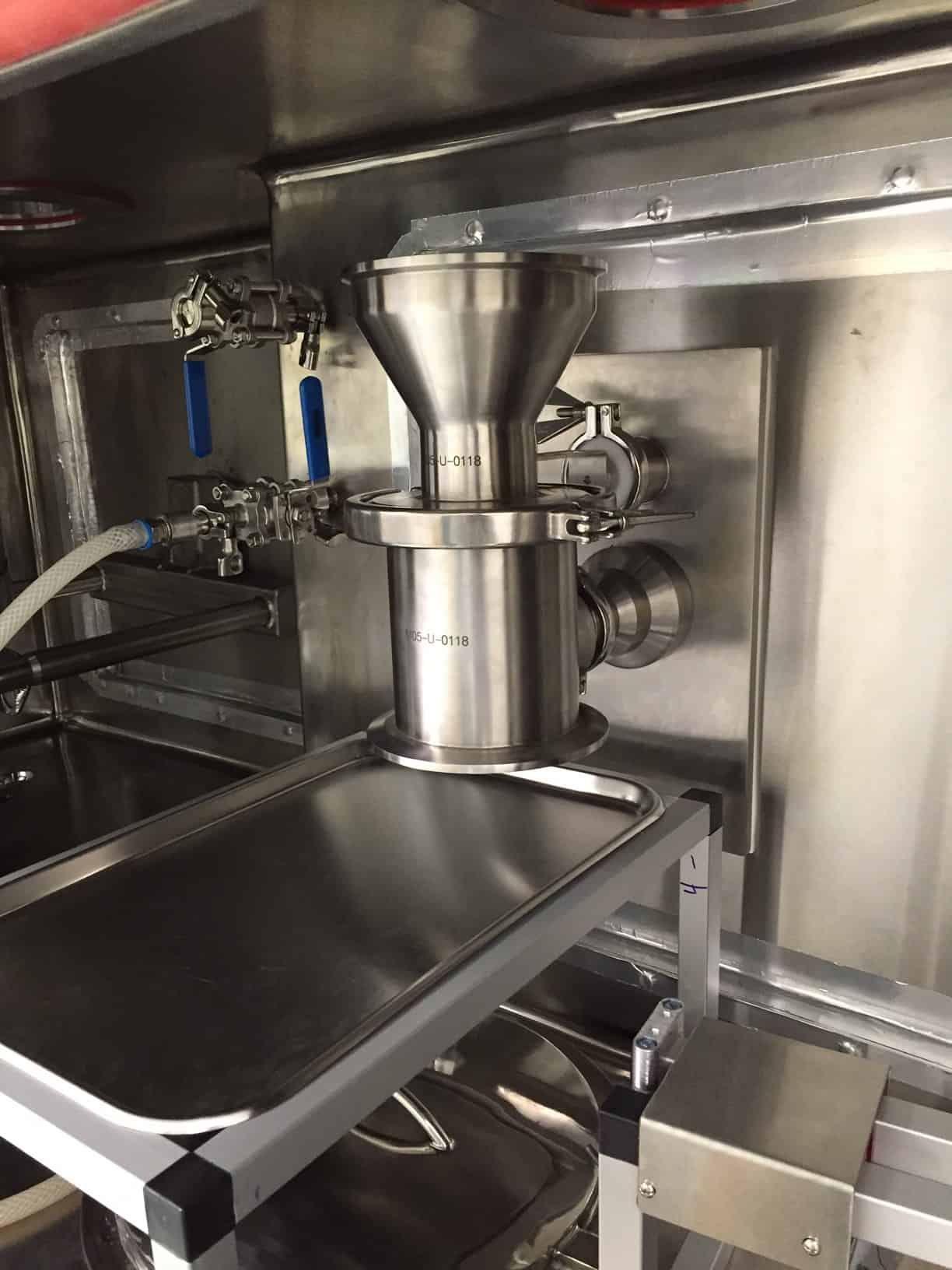 High containment isolator milling
